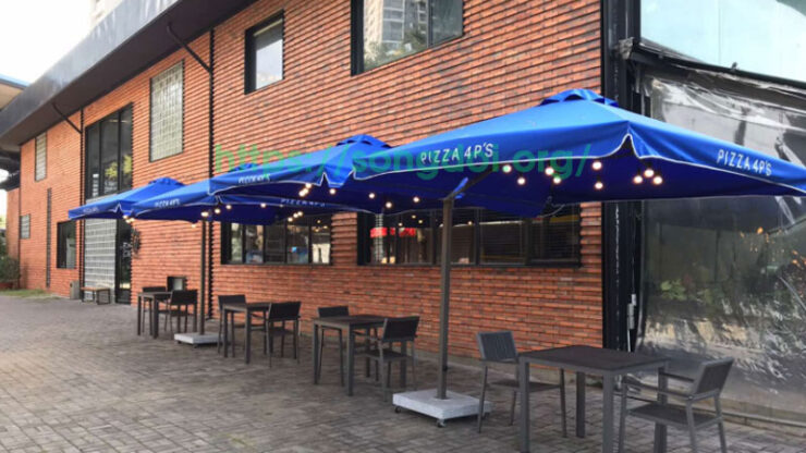 20+ Mẫu dù che nắng quán cà phê 2026 đẹp mê hồn bạn không thể bỏ lỡ 1 du che nang quan ca phe10